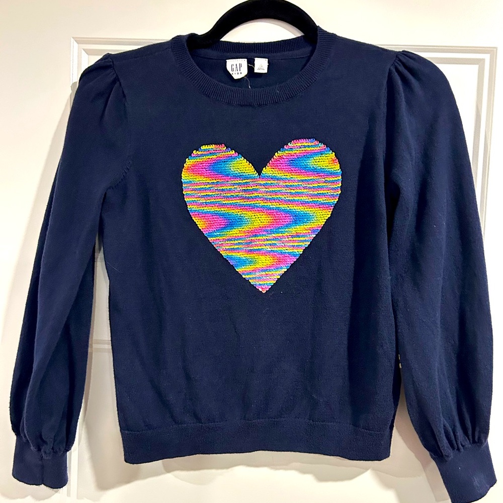Youth sweater with color changing sequined heart